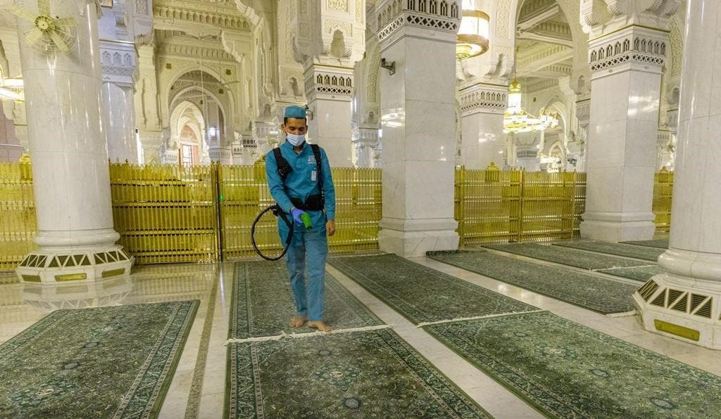 Disinfection of the brushes inside the Grand Mosque