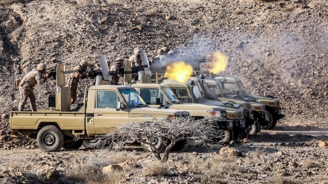 This handout photo provided by Iran’s Revolutionary Guard Corps (IRGC) official website via SEPAH News on December 23, 2021, shows the Islamic Revolutionary Guard Corps (IRGC) taking part in five-days military exercises in three provinces. (AFP)