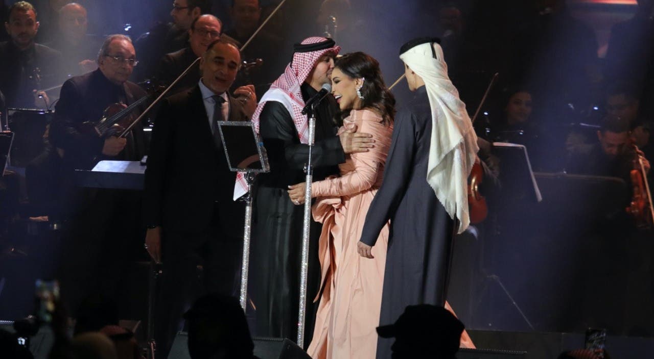 Ahlam with her husband and son - Photo by Wael Al-Hakami