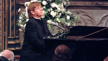 Pop singer Elton John plays a specially re-written version of his classic ‘Candle in the Wind’ during the funeral service for Diana, Princess of Wales, at Westminster Abbey, on September 6, 1997 (Reuters) 