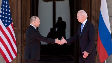 Russian President Vladimir Putin (L) shakes hands with US President Joe Biden in Geneva on June 16, 2021. (AFP)