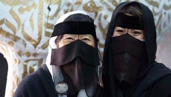  كوريات يرتدين الزي التراثي للمرأة السعودية في مهرجان الإبل