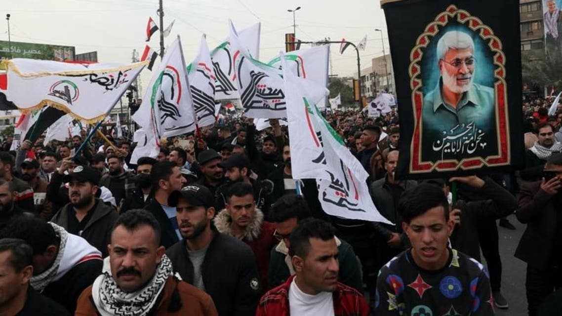 .Hundreds rally on Gen. Qassim Soleimani’s assassination anniversary, chanting anti-American slogans, in Baghdad, Iraq, on Jan. 1, 2022. (AP)