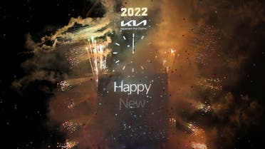 Fireworks are seen as the clock announces the New Year in Times Square, as the Omicron coronavirus variant continues to spread, in the Manhattan borough of New York City, US, on January 1, 2022. (Reuters)