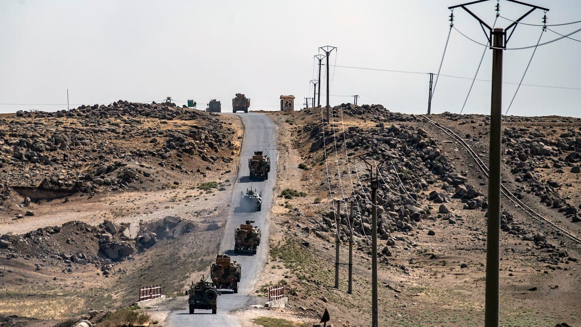 File photo of military vehicles in the countryside of Rumaylan (Rmeilan) in Syria's northeastern Hasakeh province near the Turkish border, on September 16, 2021. (AFP)