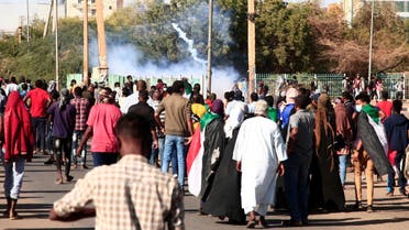 Sudanese demonstrators burn tires during a protest demanding civilian rule in the Street 40 of the Sudanese capital's twin city of Omdurman on January 4, 2022. (AFP)