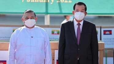 Cambodia’s PM Hun Sen (R) with Myanmar Foreign Minister Wunna Maung Lwin (L) as he arrives in Naypyidwaw, January 7, 2022, becoming the first foreign leader to visit the country since Myanmar’s generals seized power almost a year ago. Handout/Myanmar Military Information Team/AFP)