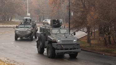 Military vehicles patrol streets in central Almaty on January 7, 2022, after unprecedented unrest in the Central Asian nation. (AFP)