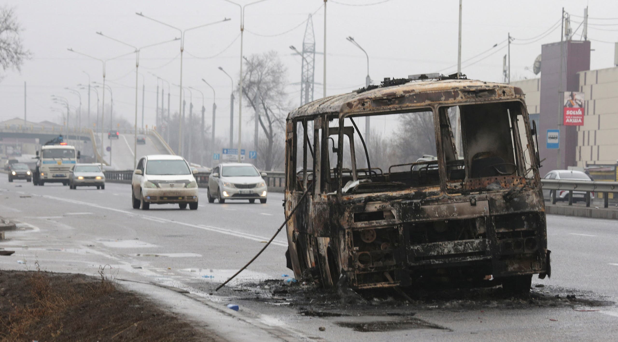 Burnt bus after protests in Almaty