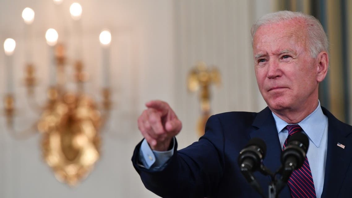 US President Joe Biden gestures as he delivers remarks on the debt ceiling from the State Dining Room of the White House on October 4, 2021 in Washington, DC.  (AFP)