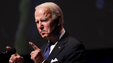 U.S. President Joe Biden gestures as he gives a speech during the memorial service honoring former U.S. Senate Majority Leader Harry Reid at The Smith Center for the Performing Arts in Las Vegas, Nevada, U.S., January 8, 2022. REUTERS/Evelyn Hockstein