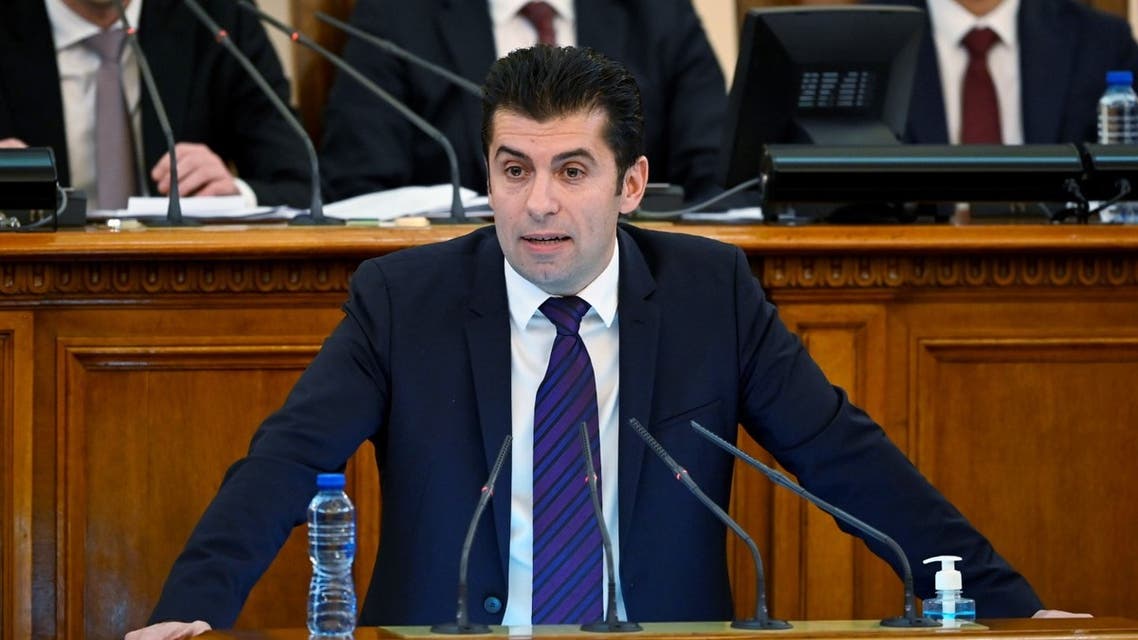 Bulgaria's new Prime Minister and leader of We Continue the Change (PP) party Kiril Petkov (C) speaks before being sworn in at the Bulgarian Parliament building in Sofia, on December 13, 2021. (AFP)