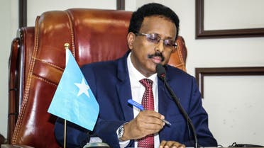 Somalia's President Mohamed Abdullahi Mohamed, commonly known by his nickname of Farmajo, attends the special assembly for abandoning the two-year extension of his presidential term and requesting the immediate election to ease the recent political tension at Villa Hargeisa in Mogadishu on May 1, 2021. (AFP)