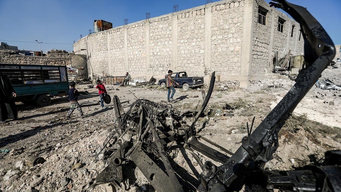 People inspect the scene of a car bomb in the Turkish-controlled town of al-Bab in the north of Syria's Aleppo province on Nov. 24, 2020. (File Photo: AFP)