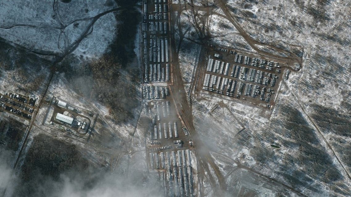 This satellite image released by Maxar Technologies on December 5, 2021, reportedly shows Russian ground forces equipment near Yelnya, Russia, on November 9, 2021. Russia is orchestrating a multi-front offensive involving up to 175,000 troops as soon as next year, The Washington Post reported reported December 3, 2021,, as Ukraine warned that a large-scale attack may be planned for next month. Moscow's plans involve extensive movement of 100 battalion tactical groups with an estimated 175,000 personnel, along with armor, artillery and equipment, a US administration official told the Post on condition of anonymity. (Photo by Handout / Satellite image ©2021 Maxar Technologies / AFP) / GTY / RESTRICTED TO EDITORIAL USE - MANDATORY CREDIT AFP PHOTO / SATELLITE IMAGE ©2021 MAXAR TECHNOLOGIES - NO MARKETING - NO ADVERTISING CAMPAIGNS - DISTRIBUTED AS A SERVICE TO CLIENTS - THE WATERMARK MAY NOT BE REMOVED/CROPPED - GTY / RESTRICTED TO EDITORIAL USE - MANDATORY CREDIT AFP PHOTO / Satellite image ©2021 Maxar Technologies - NO MARKETING - NO ADVERTISING CAMPAIGNS - DISTRIBUTED AS A SERVICE TO CLIENTS - THE WATERMARK MAY NOT BE REMOVED/CROPPED