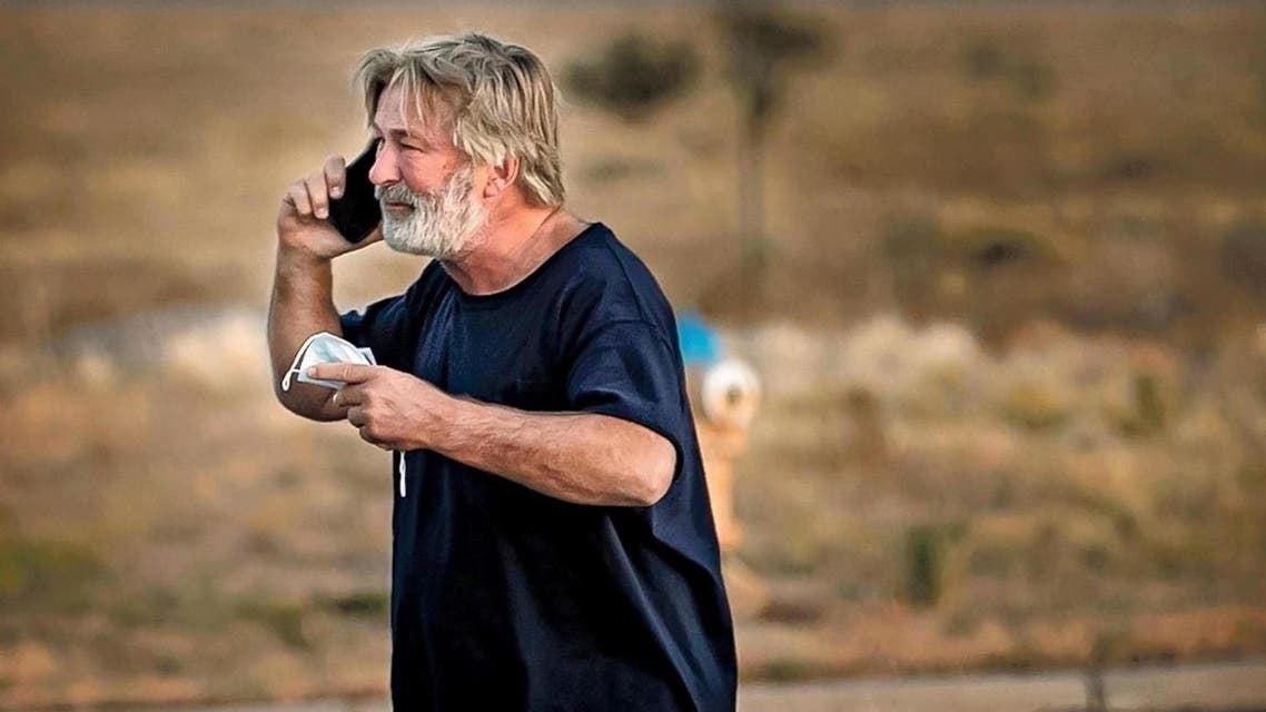 (Jim Weber/Santa Fe New Mexican via Associated Press) Alec Baldwin speaks on the phone in the parking lot outside the Santa Fe County Sheriff’s Office in Santa Fe, N.M., after he was questioned about a shooting on the set of the film “Rust” on the outskirts of Santa Fe, Thursday, Oct. 21, 2021. Baldwin fired a prop gun on the set, killing cinematographer Halyna Hutchins and wounding director Joel Souza, officials said. (Jim Weber/Santa Fe New Mexican via AP)