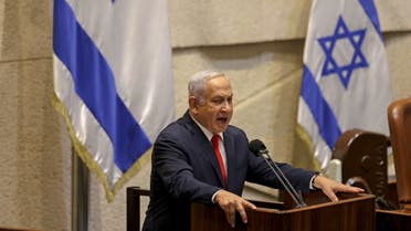 Former Israeli prime minister and current leader of the opposition Benjamin Netanyahu speaks during a plenum session and vote on the state budget at the assembly hall in the Knesset (Israeli parliament), in Jerusalem on November 3, 2021. (AFP)