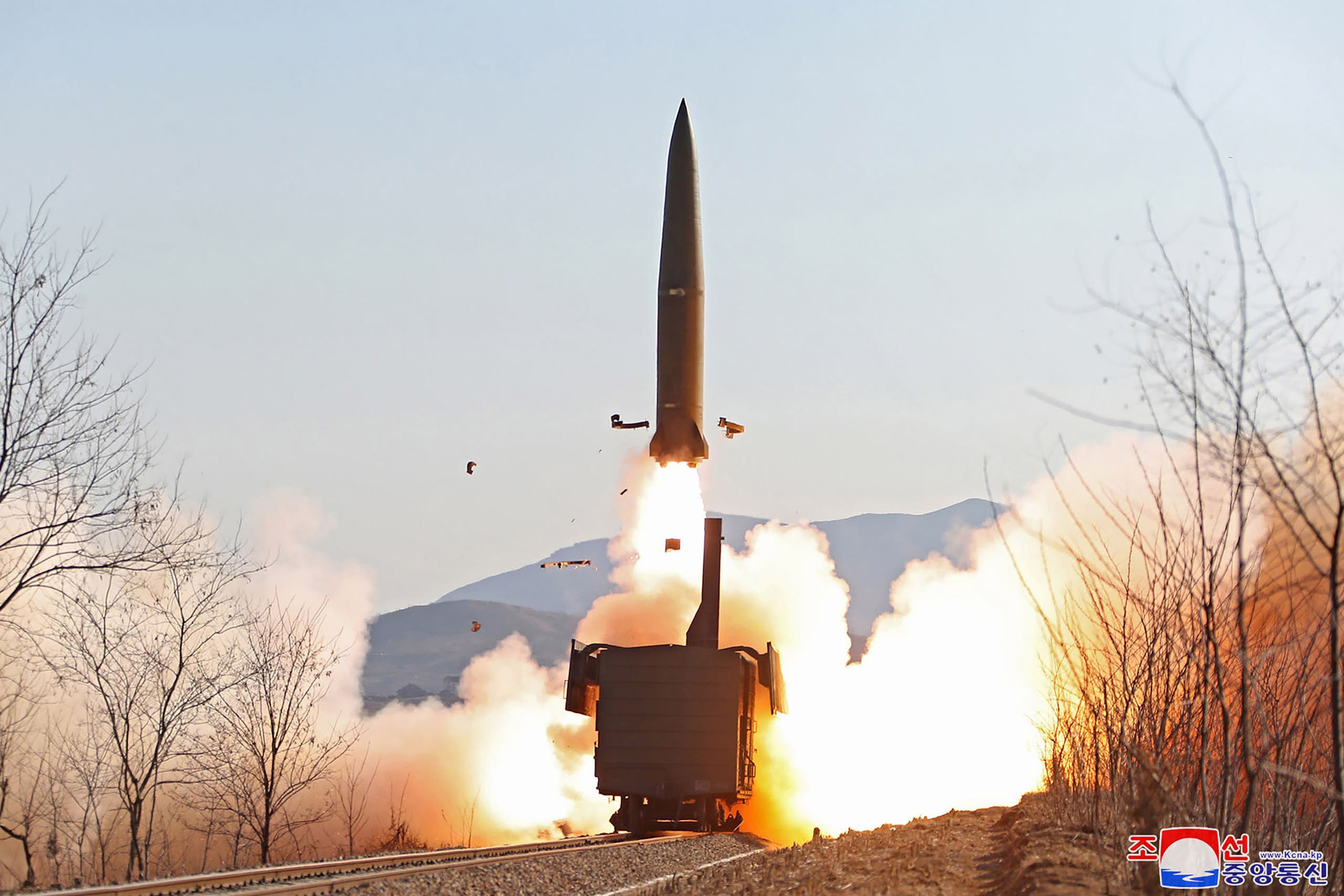 This picture taken on January 14, 2022 and released from North Korea's official Korean Central News Agency (KCNA) on January 15 shows a firing drill of railway-borne missile regiment is held in North Pyongan Province. (AFP)