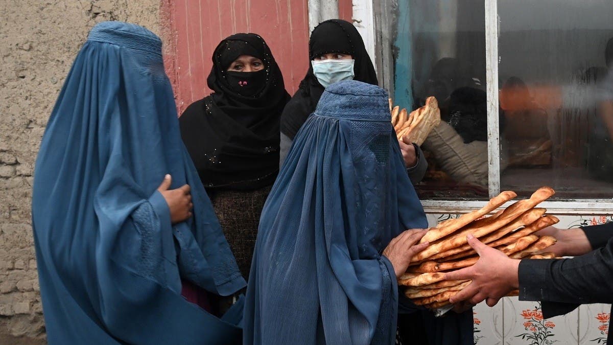 Afghanistan Burka Porn - Desperate Afghans queue for free bread as poverty crisis deepens | Al  Arabiya English