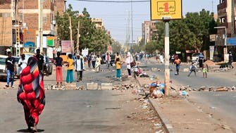 Sudanese barricade streets, close shops after seven people killed  