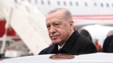 Turkish President Recep Tayyip Erdogan enters his car after a welcoming ceremony upon his arrival at Tirana's Mother Teresa International Airport on January 17, 2022. Turkish President Recep Tayyip Erdogan will inaugurate newly completed apartment blocks in Lac, north of Tirana, built by funds donated by the Turkish government following the November 2019 deadly earthquake that hit Albania, killing 51 people and causing damages to the tune of 7 percent of GDP. (Photo by Gent SHKULLAKU / AFP)  albania - turkey - politics - diplomacy  albania - turkey - politics - diplomacy  albania - turkey - politics - diplomacy