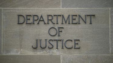 In this file photo taken on April 18, 2019 a Department of Justice sign is seen on the wall of the US Department of Justice building in Washington, DC. (AFP)
