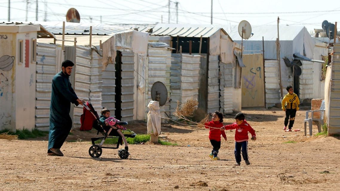 Syrian children play in the Zaatari refugee camp, 80 kilometers (50 miles) north of the Jordanian capital Amman on February 15, 2021. (AFP)