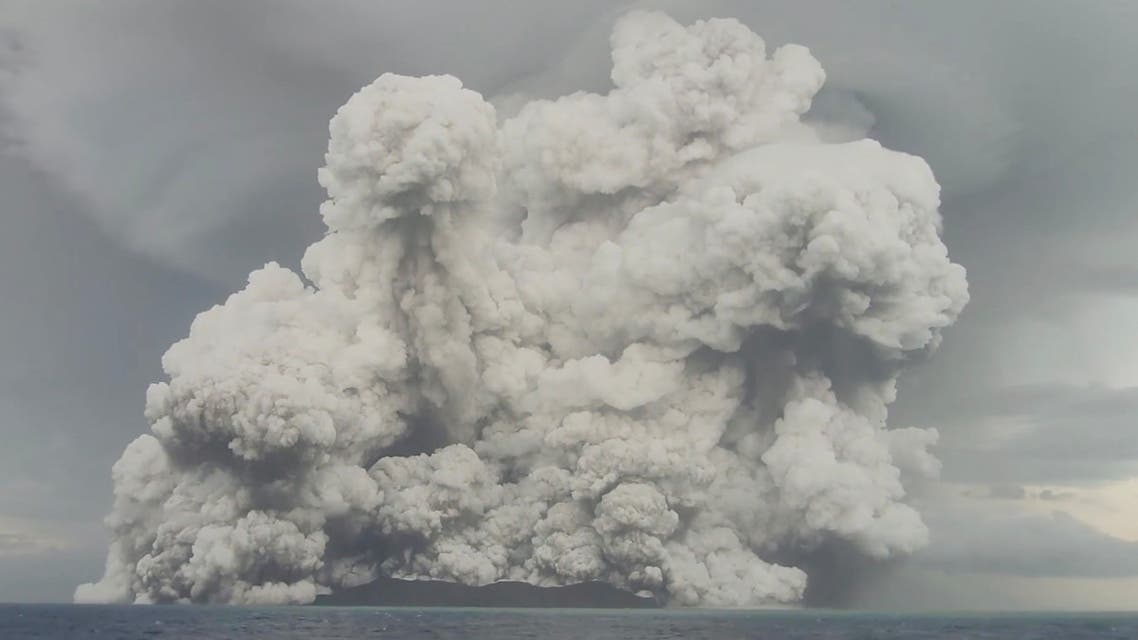 An eruption occurs at the underwater volcano Hunga Tonga-Hunga Ha'apai off Tonga, January 14, 2022 in this screen grab obtained from a social media video. Video recorded January 14, 2022. (Reuters)