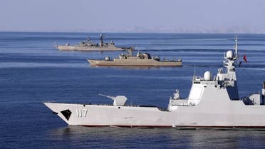 A handout photo made available by the Iranian Army office on December 28, 2019 shows a view of the Chinese People's Liberation Army Navy Surface Force Type 052D destroyer Xining (117), the Islamic Republic of Iran Navy frigate ALBORZ (72), and the Russian Navy Neustrashimyy-class frigate Yaroslav Mudry during joint Iran-Russia-China naval drills in the Indian Ocean and the Gulf of Oman. (AFP)