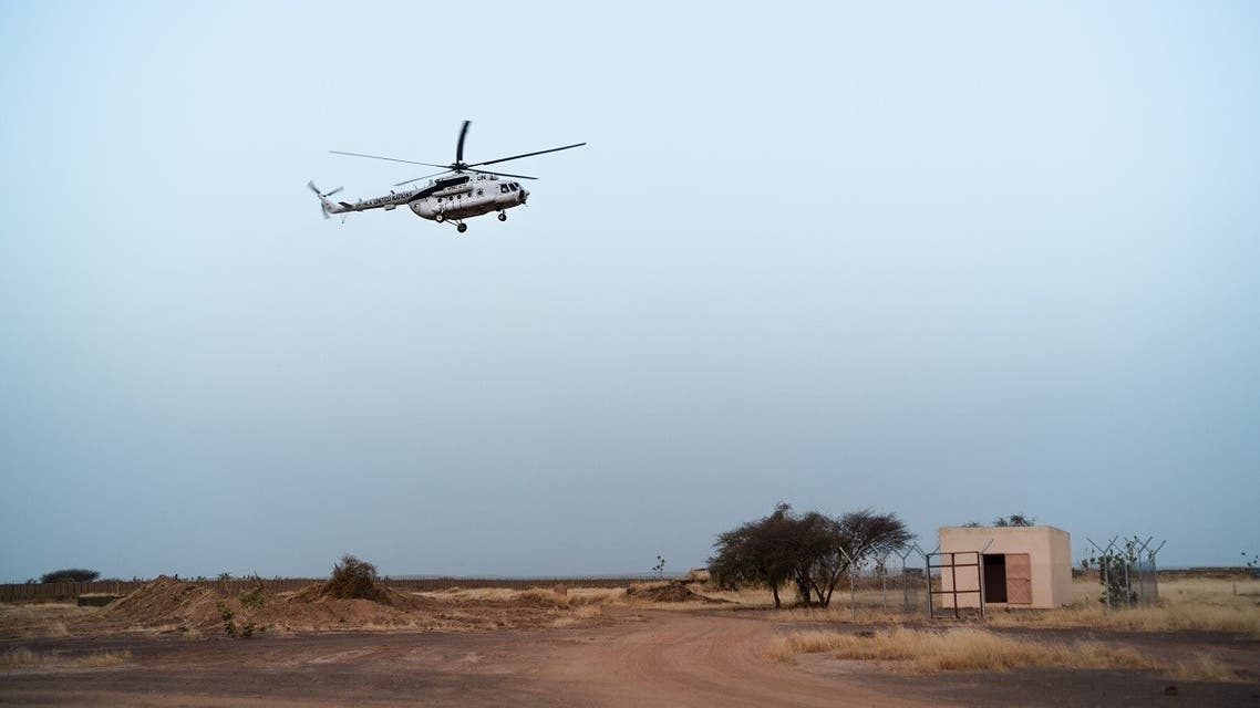 An MI-8 helicopter of the UN Multidimensional Integrated Stabilization Mission in Mali (MINUSMA), lands at the UN base in Menaka, Oct. 22, 2021. (AFP)