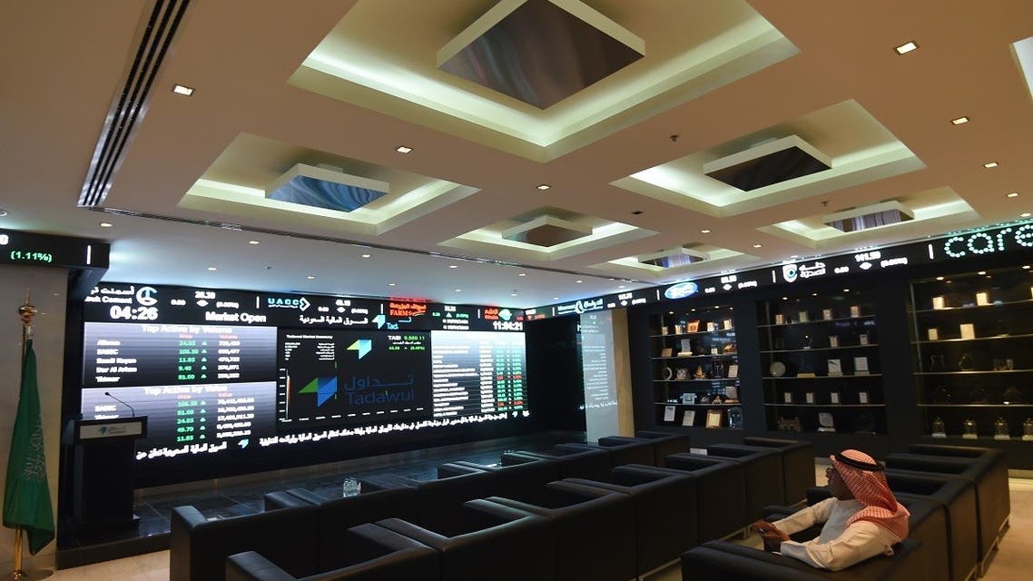 A Saudi investor monitors the stock exchange at the Saudi Stock Exchange, or Tadawul, in the capital Riyadh. (AFP)