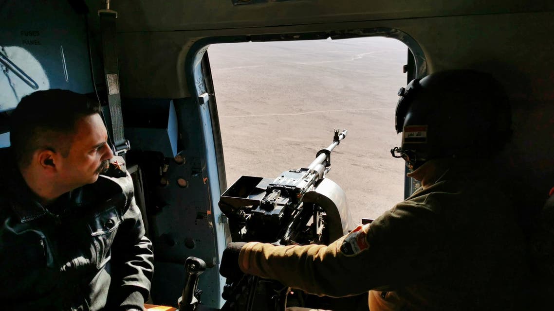Iraqi security forces are seen in a helicopter during military operations to search for Islamic State militants in Anbar province, Iraq December 29, 2019. (Reuters)