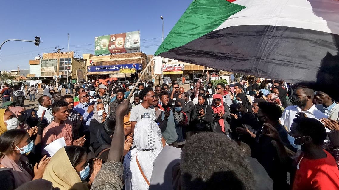 Young women and men take to the streets of the Sudanese capital Khartoum, to protest against the killings of dozens in a crackdown since last year's military coup, January 20, 2022. (AFP)