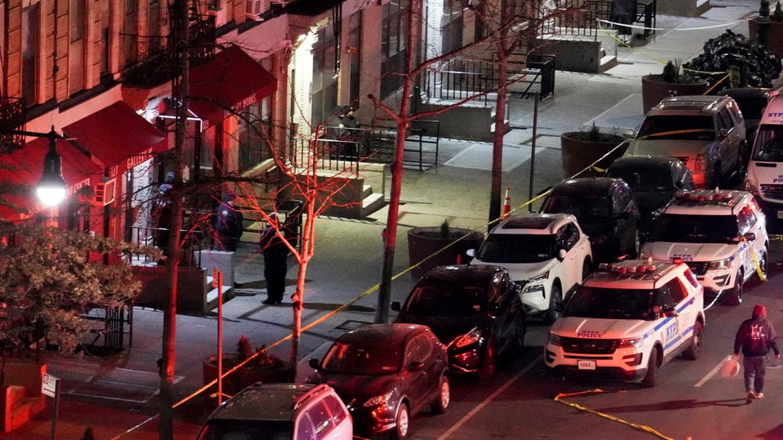 Emergency personnel respond at the scene where NYPD officers were shot while responding to a domestic violence call in the Harlem neighborhood of New York City, US, January 21, 2022. (Reuters)