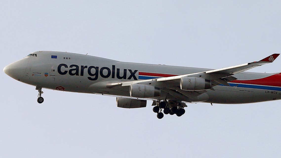 A Boeing 747-400F jet of Luxembourg's Cargolux cargo airline transporting the Solar Impulse 2 aircraft approaches to land at the airbase in Duebendorf, Switzerland November 22, 2016. (Reuters)
