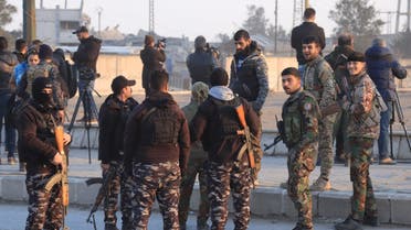 SDF deploy outside Ghwayran prison in Syria's Hasakeh, Jan. 26, 2022, after having declared over the facility following its takeover by ISIS militants. (AFP)