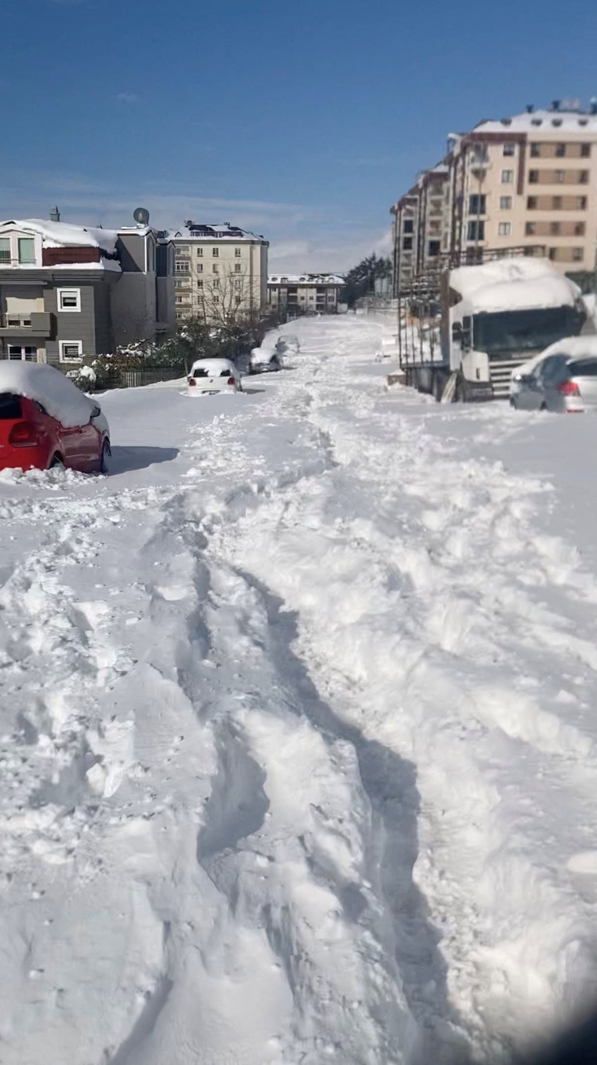Snow is seen in Pinartepe Neighborhood, Istanbul, Turkey, January 25, 2022, in this still image obtained from a social media video. (Reuters)