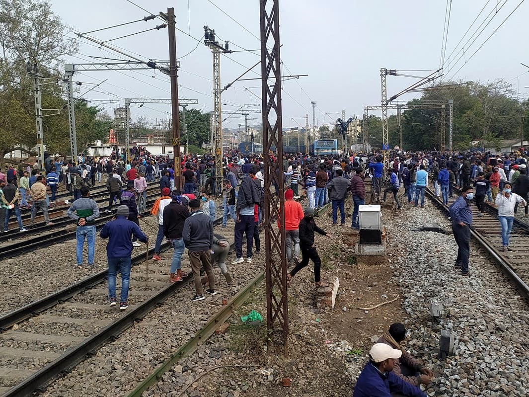 Mobs burn train carriages in rail jobs protest in eastern India | Al  Arabiya English