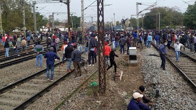 Mobs burn train carriages in rail jobs protest in eastern India