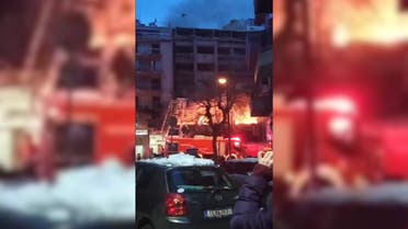 Firefighters at the scene of an explosion in Athens that caused a fire. (Screengrab)