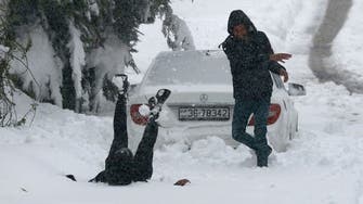 Snow blankets Middle East as residents rejoice cold conditions
