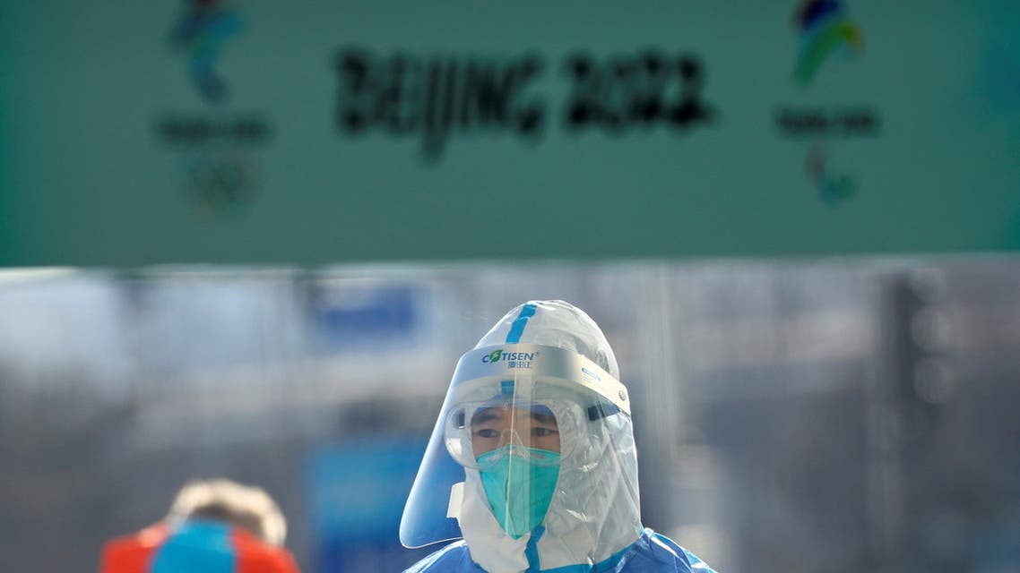 A Red Cross ambulance paramedic wears a protective suit as a protection from the coronavirus disease (COVID-19) at the Main Press Centre ahead of the Beijing 2022 Winter Olympics in Beijing, China January 27, 2022. (Reuters)