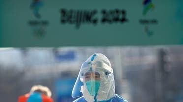 A Red Cross ambulance paramedic wears a protective suit as a protection from the coronavirus disease (COVID-19) at the Main Press Centre ahead of the Beijing 2022 Winter Olympics in Beijing, China January 27, 2022. (Reuters)