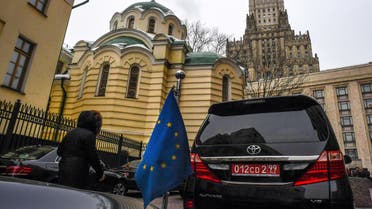 A European Union flag is seen on a car parked outside the Russian Foreign Ministry headquarters in Moscow on March 21, 2018 as foreign dipomatic staff attend a meeting with the ministry's experts on the poisoning of former double agent Sergei Skripal in an English city this month. (Photo by Yuri KADOBNOV / AFP)