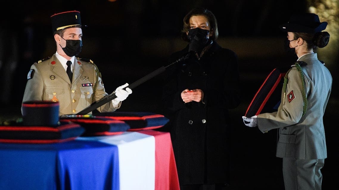 France's Defense Minister Florence Parly (2ndR) awards a posthumous Legion of Honor as she pays tribute in front of the coffin of French brigadier-chief Alexandre Martin killed in Mali, Jan. 27, 2022. (AFP)