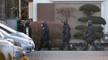 Police officers deploy around a private house where a man holds a hostage in Fujimino, Saitama prefecture on January 28, 2022. ( Jiji Press/AFP)