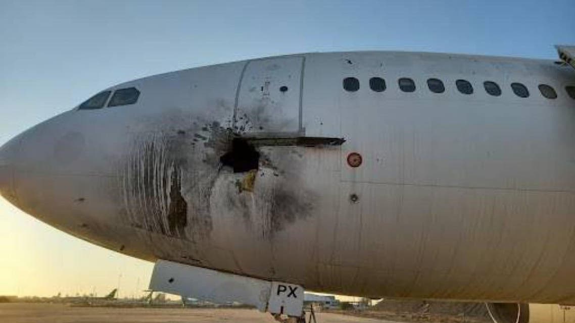 Photo shows a plane damaged by an apparent missile strike in Iraq's Baghdad airport, according to Iraqi media sources.  January 28, 2022. (Twitter)