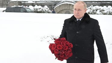 Russian President Vladimir Putin attends a flower-laying ceremony marking the 78th anniversary of lifting of the Leningrad siege during World War Two at the Piskaryovskoye Memorial Cemetery in Saint Petersburg, Russia January 27, 2022. Sputnik/Aleksey Nikolskyi/Kremlin via REUTERS ATTENTION EDITORS - THIS IMAGE WAS PROVIDED BY A THIRD PARTY.