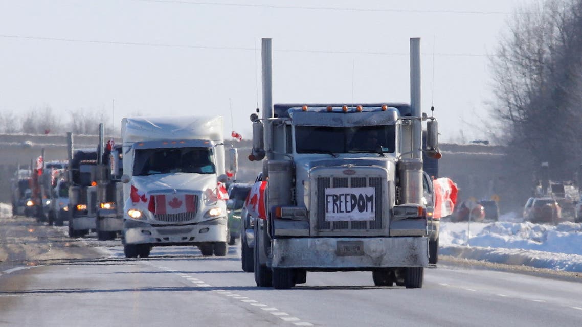 Truckers arrive in a convoy to protest coronavirus disease (COVID-19) vaccine mandates for cross-border truck drivers, in Ottawa, Ontario, Canada, January 28, 2022. (Reuters)