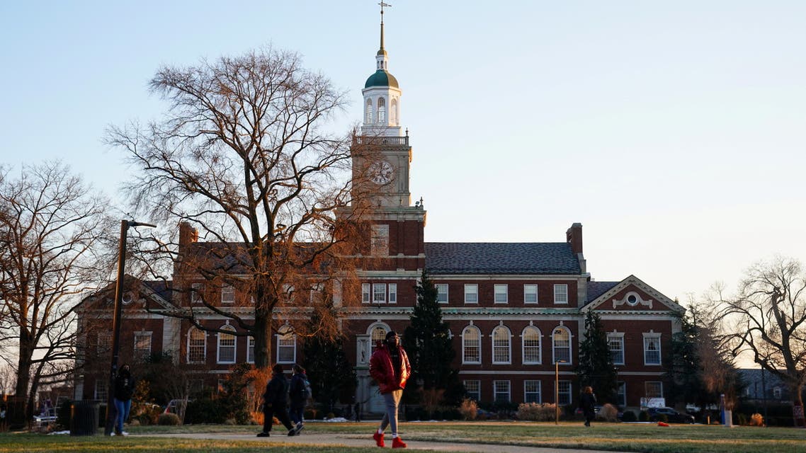 Students walk on the campus of Howard University, one of six historically Black colleges and universities (HBCUs) across the United States that received bomb threats, in Washington, U.S. January 31, 2022. REUTERS/Sarah Silbiger